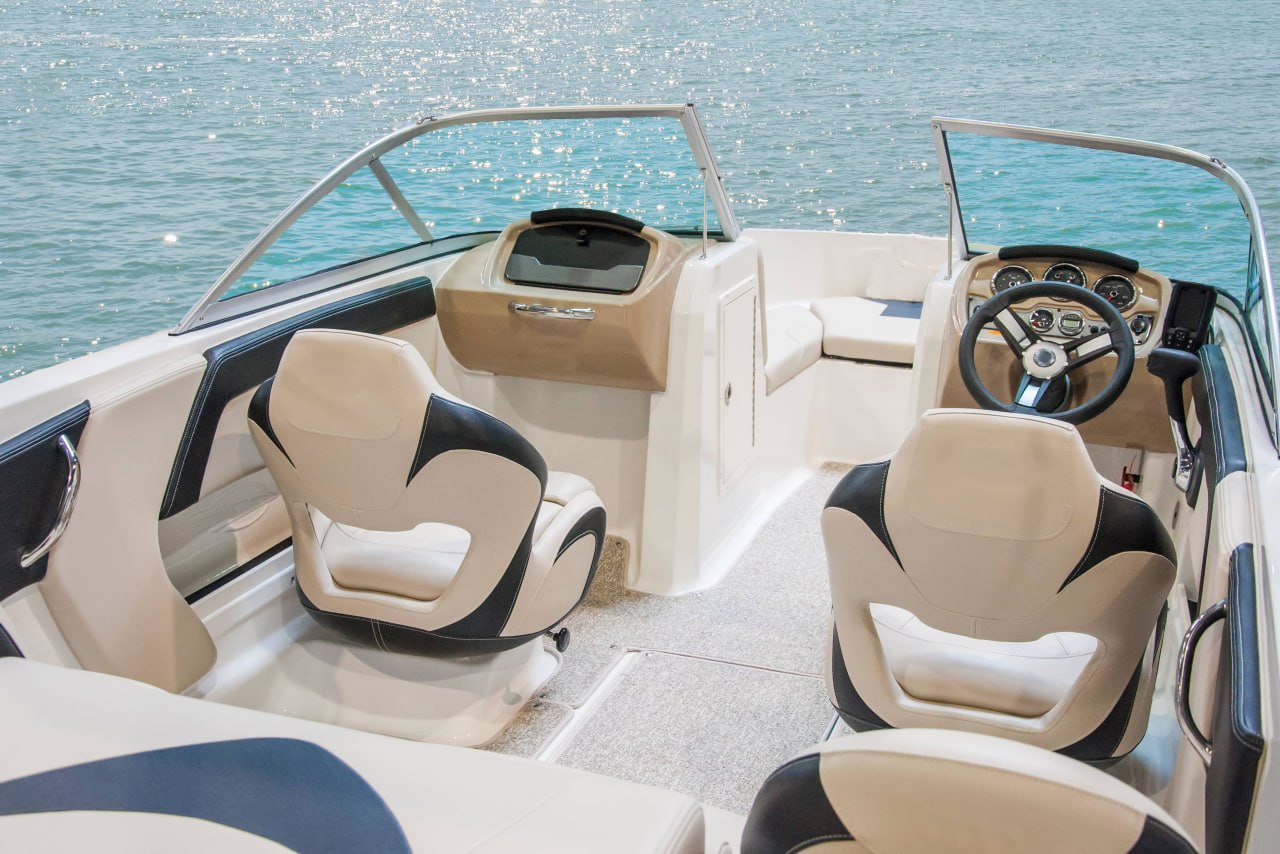 Marine vinyl cockpit seats on a boat exposed to UV, water, and outdoor use